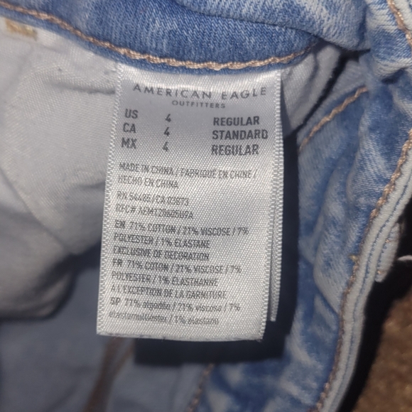 American Eagle Outfitters Destroyed Light Acid Wash Super Stretchy Jeans - Picture 8 of 15